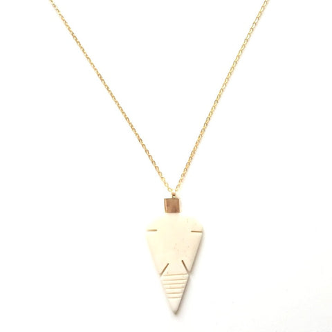Image of Arrowhead Bone Pendant on a Long Gold Chain